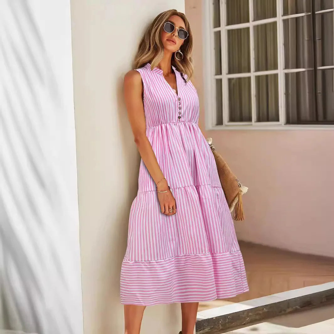 Flowy women's striped sleeveless tiered midi dress, button-down design. Stylish summer fashion for casual days.