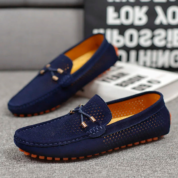 Front view of men's classic slip-on loafers, showcasing breathable design and elegant casual style.