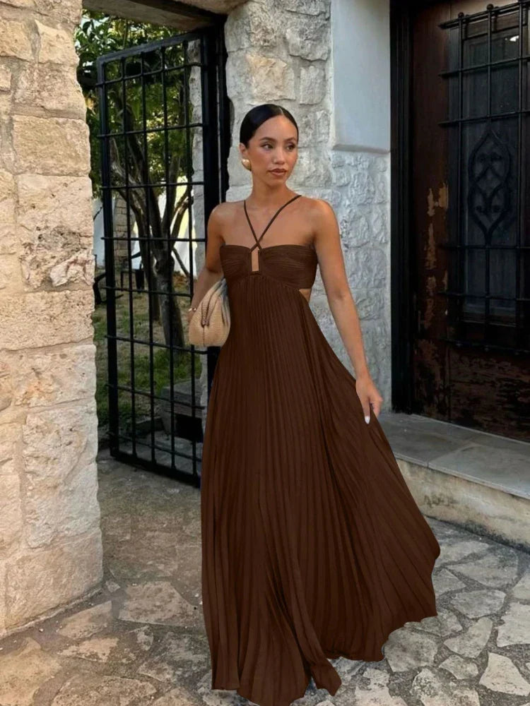 Flowy women's pleated maxi dress, elegant & comfortable. Versatile long dress for various events.
