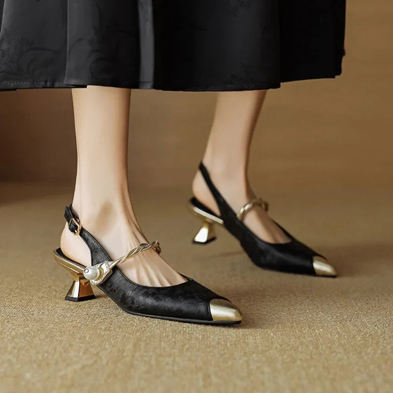 Modern women's footwear: elegant pointed toe high heels for professional or party attire.