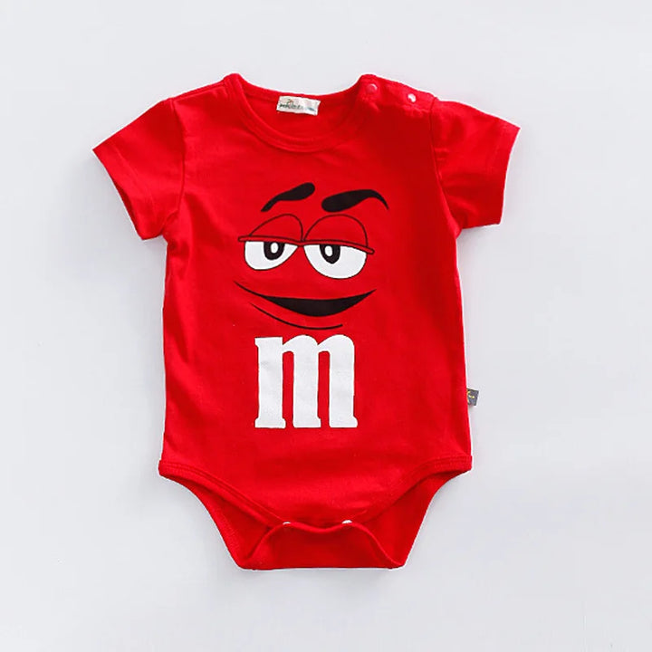 Fashionable colorful baby romper with M&M faces, a comfortable short sleeve summer outfit for infants.