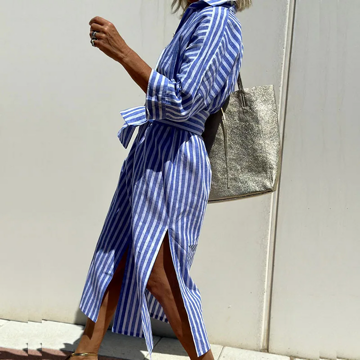 Effortlessly chic women's striped shirt dress. Versatile day dress for comfort and elegant casual style.
