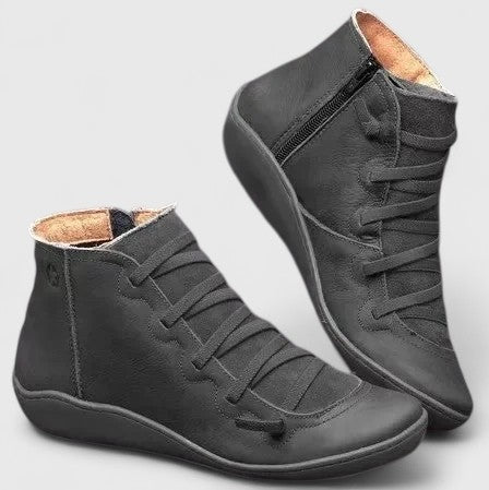 Supportive women's orthopaedic boots, ensuring maximum comfort & stability for all-day wear. Stylish & practical.