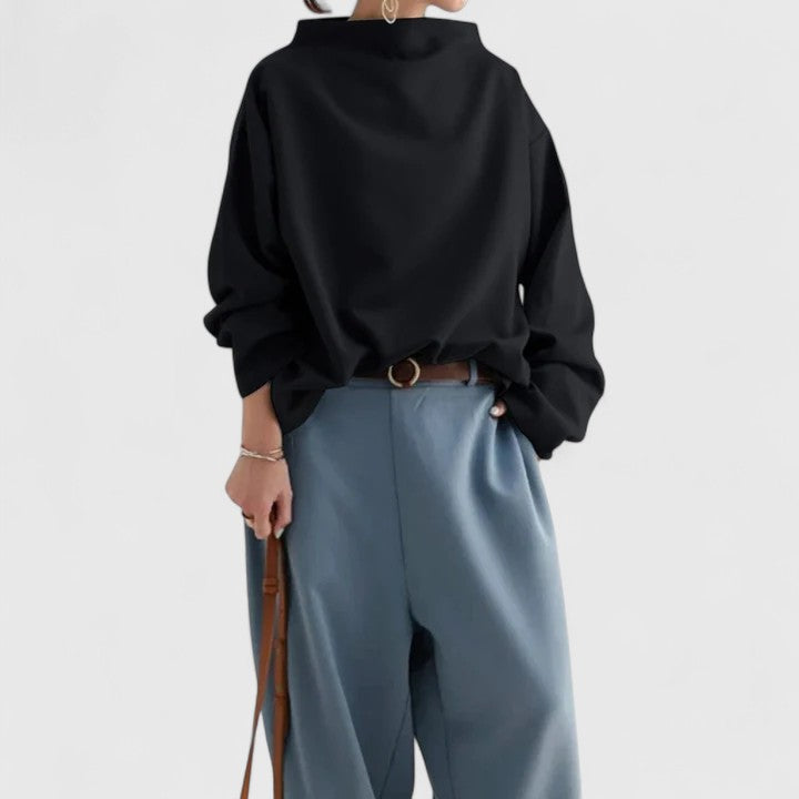 Chic and classic high neck women's top. This comfortable, elegant apparel is perfect for sophisticated fashion.
