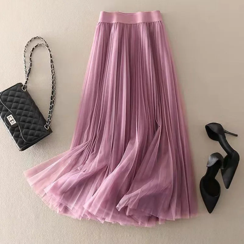 Comfortable women's high-waisted A-line midi skirt with elegant pleats, great for any occasion.