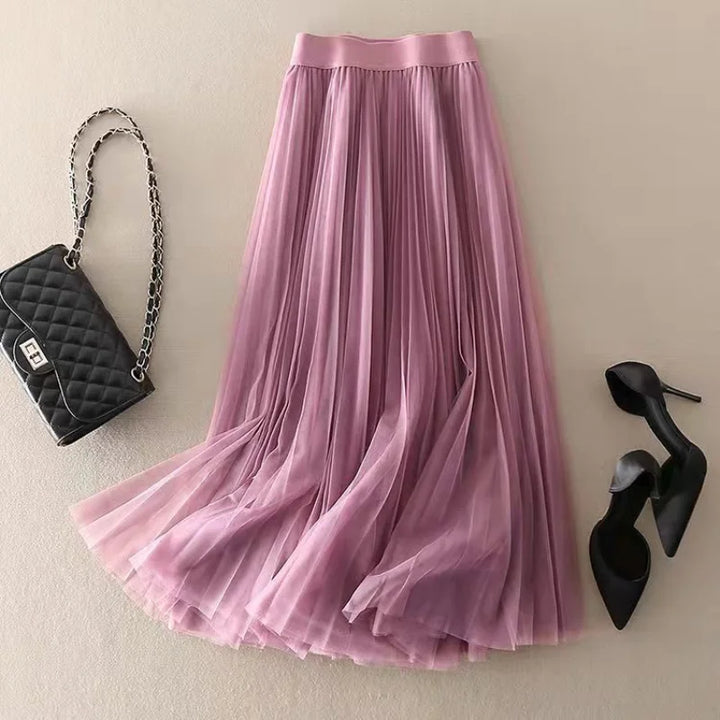 Comfortable women's high-waisted A-line midi skirt with elegant pleats, great for any occasion.