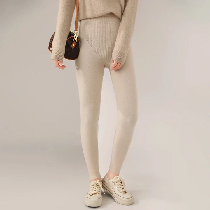 Warm women's high waist cashmere leggings, flexible fit for winter wear & stylish comfort.