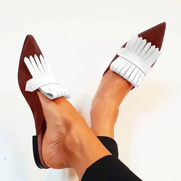 View of the open-back design on women's elegant heel pumps, providing both style & comfort.
