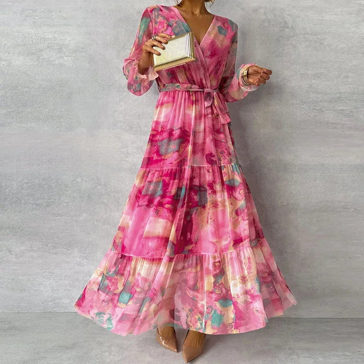 Stylish women's pink floral wrap midi dress, an elegant choice for wedding guests, summer parties, and formal occasion wear.
