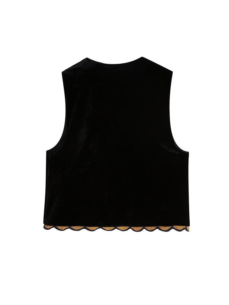 Sophisticated women's sleeveless jacket, sequin & floral patchwork, ideal for elegant fashion and events.