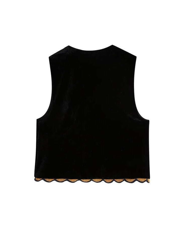 Sophisticated women's sleeveless jacket, sequin & floral patchwork, ideal for elegant fashion and events.