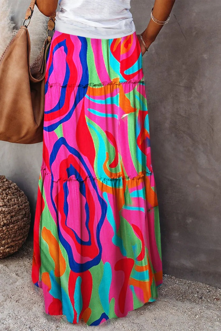 Stylish high-waisted A-line maxi skirt for women, vibrant floral print, casual yet elegant.