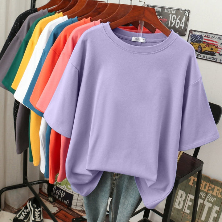 Flattering plus-size women's comfortable shirt. Short-sleeve, round-neck casual top, perfect for everyday fashion.