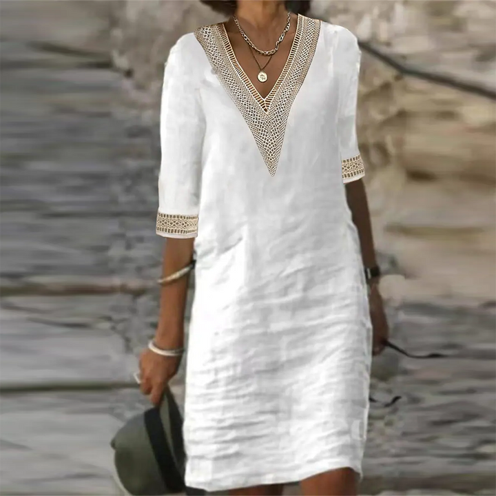 Elegant women's sleeveless midi summer dress. Lightweight & versatile for day or party wear.