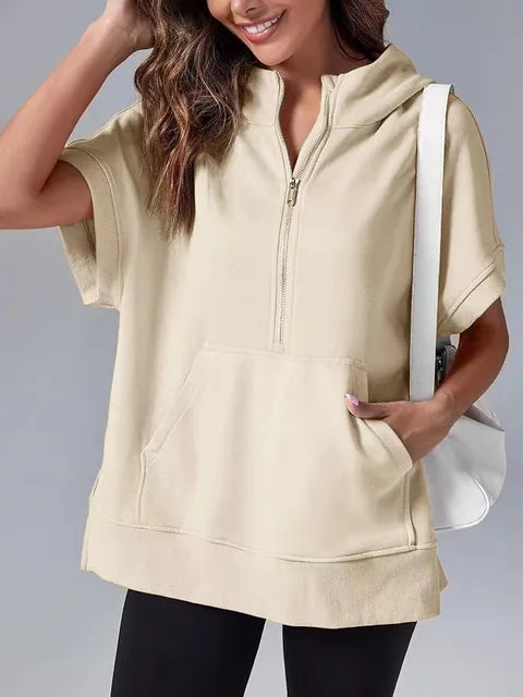 Soft & comfortable women's short sleeve half-zip hoodie, great for casual, relaxed wear.