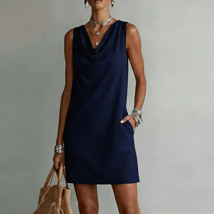 Versatile sleeveless mini dress for women with a stylish cowl neck. Ideal for smart casual or weekend wear.