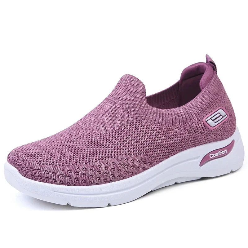 Lightweight, breathable women's slip-on trainers with arch support for ultimate comfort & casual walking.