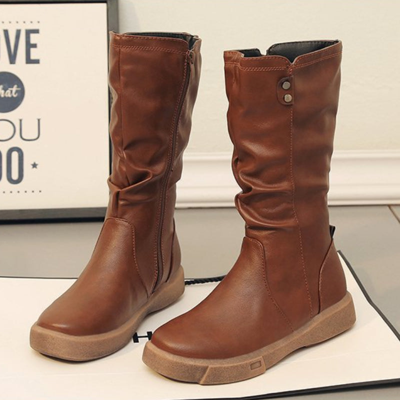 Versatile women's mid-calf boots, casual design, side zipper. Great everyday wear & fall/winter fashion.