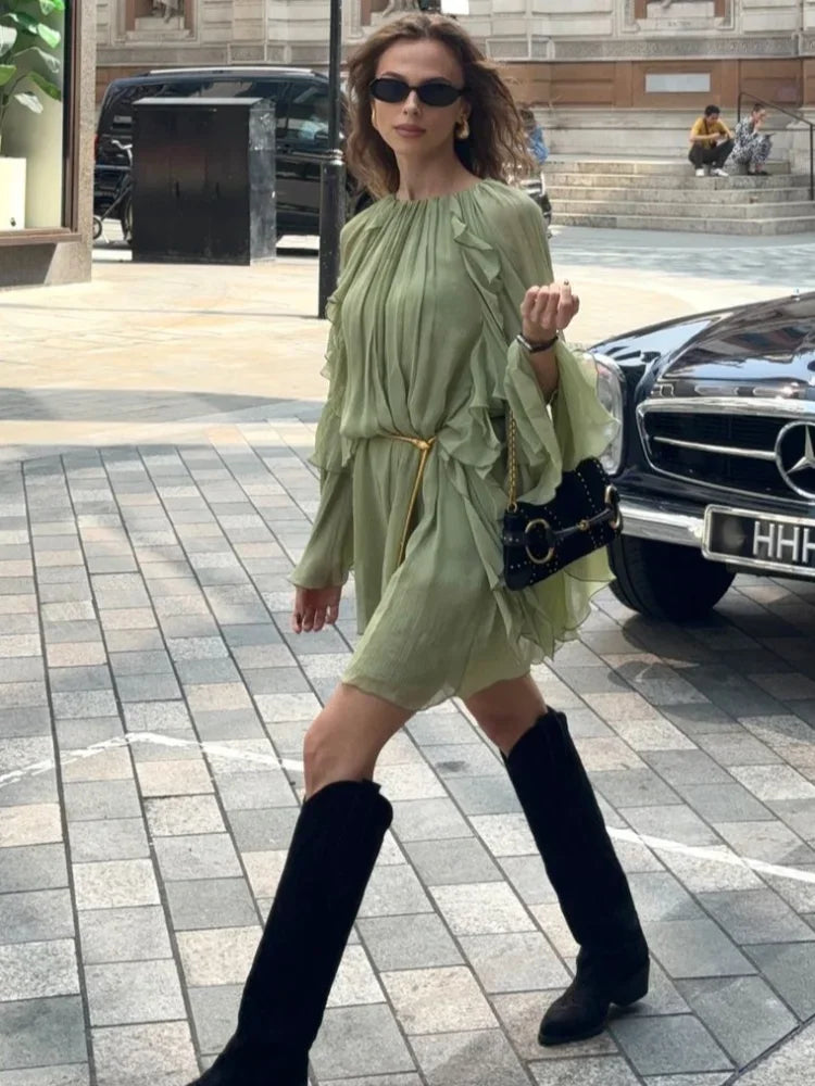Relaxed fit women's tiered mini dress. Dreamy flowing design, ideal for summer days.