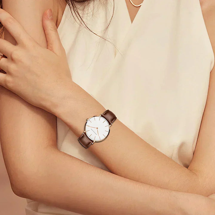 Mivona women's round dial wrist watch with a genuine leather strap, minimalist and elegant.