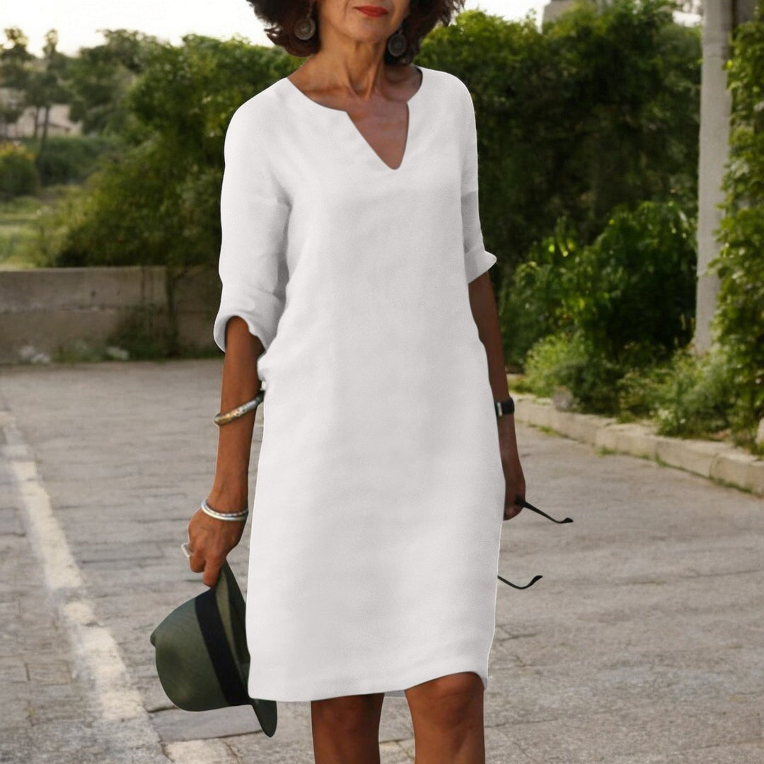 Stylish women's elegant midi dress. Comfortable, flattering, and versatile for summer casual or daywear fashion.