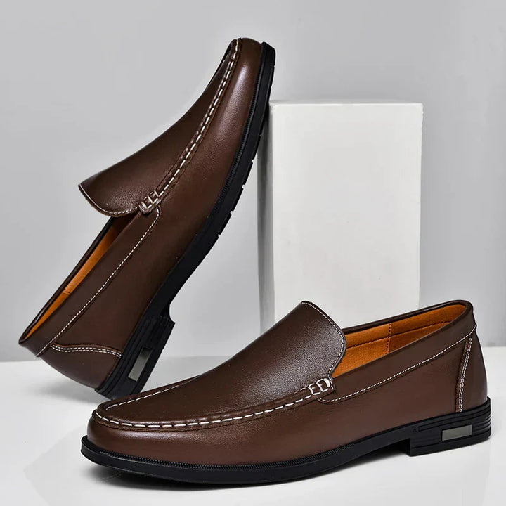 Casual brown slip-on loafers for men, offering comfort and relaxed elegant style.