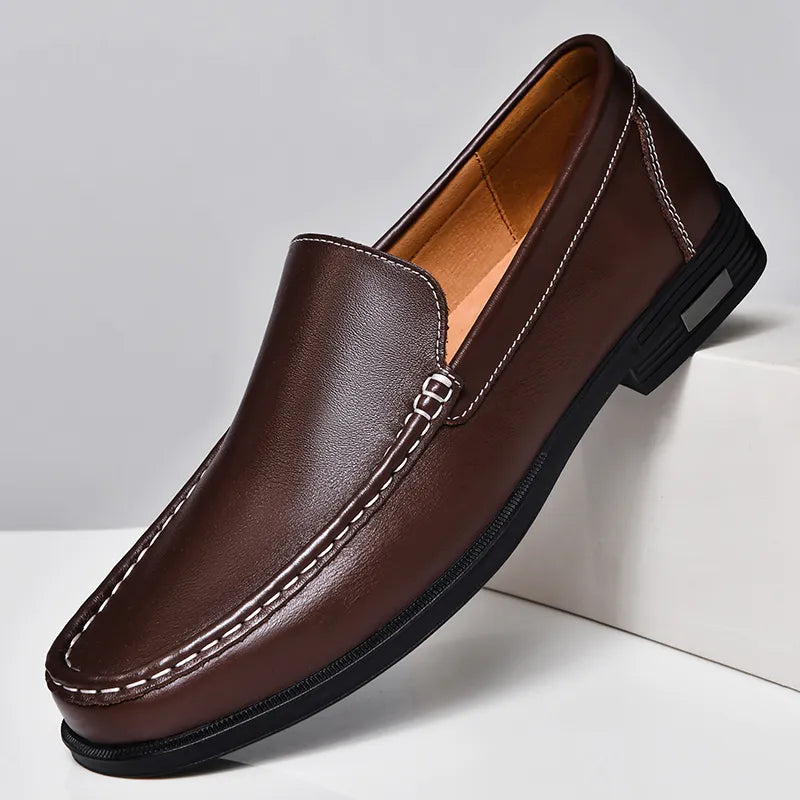Men's black slip-on comfortable loafers, ideal for everyday casual or formal wear.