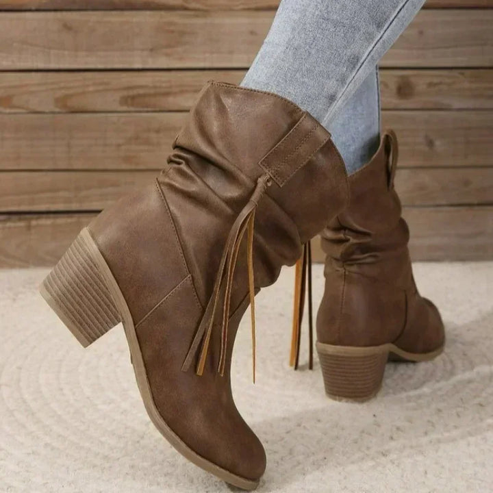 Women's dark brown western ankle boots with block heel, stylish and comfortable cowgirl footwear.