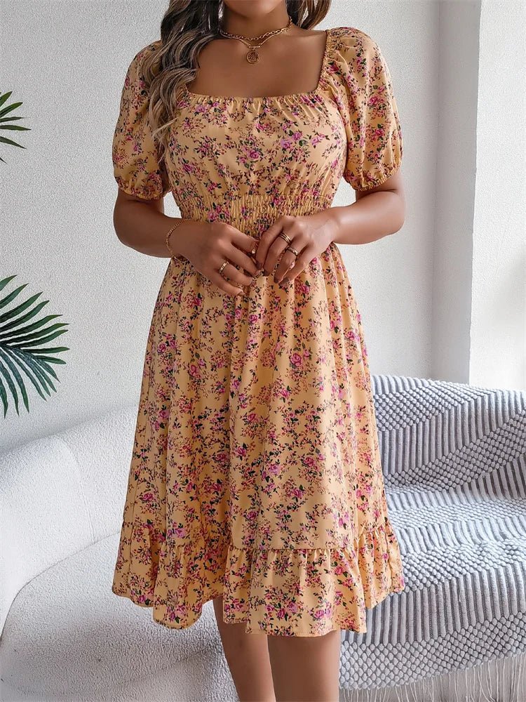 Elegant floral smocked midi dress, women's fashion with puff sleeves and a sophisticated look.