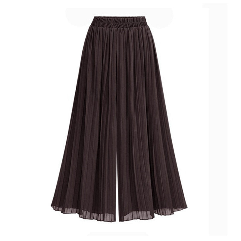 Flowy women's wide leg trousers with unique mesh panels, designed for comfort and a sophisticated look.