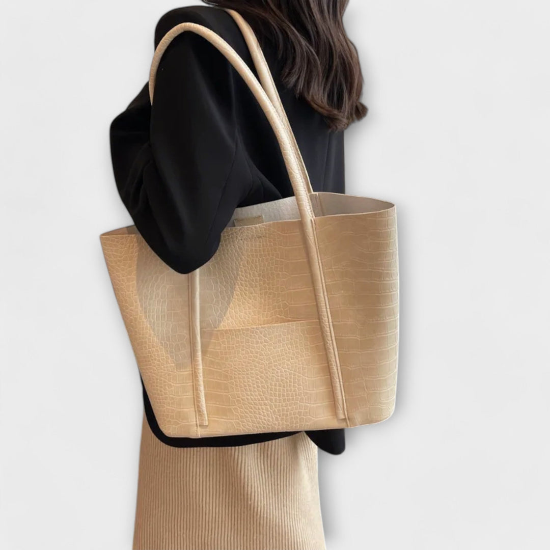 Classic faux leather women's shoulder bag, showcasing a beautiful vintage design ideal for everyday wear.