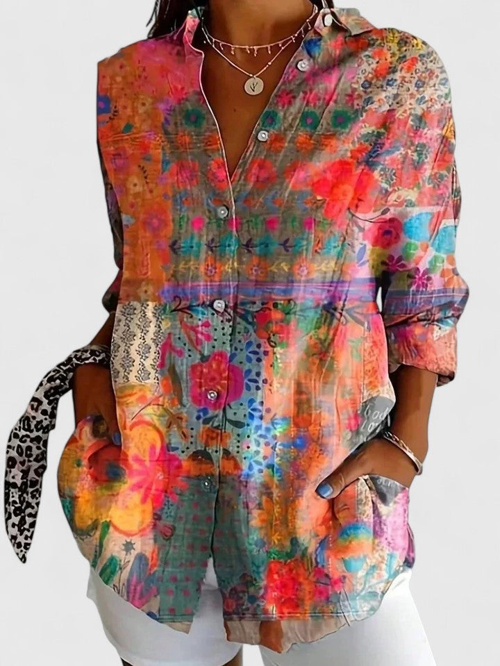 Colorful floral print women's blouse, a versatile fashion top for casual wear or elegant summer styles.