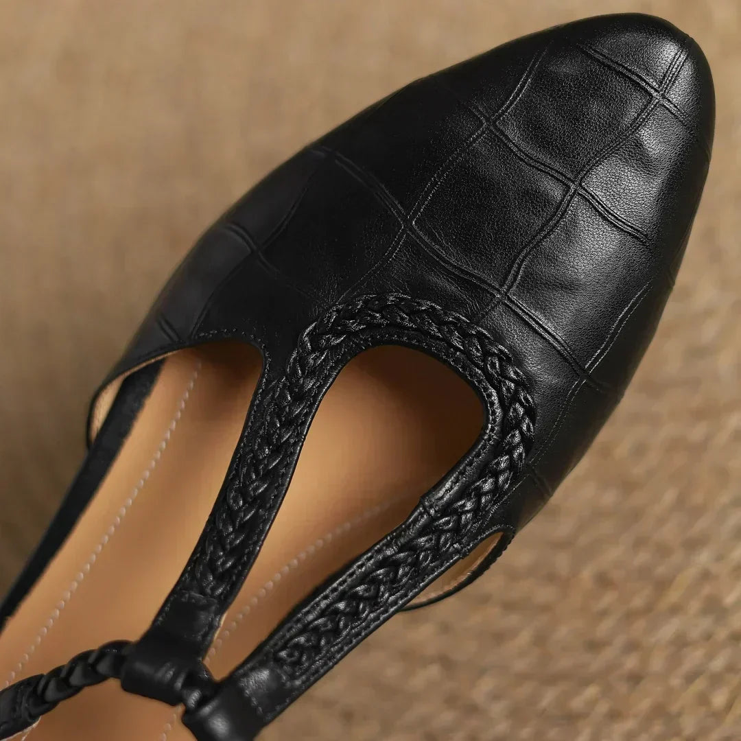 Classic women's black leather Mary Jane flats, vintage comfort, low heel shoes for everyday elegant style.