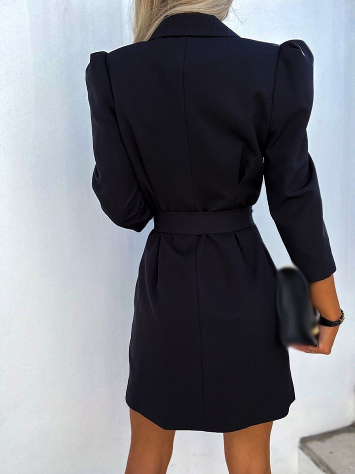 Elegant women's double-breasted blazer dress featuring a tailored silhouette & a matching belt, ideal for formal wear.