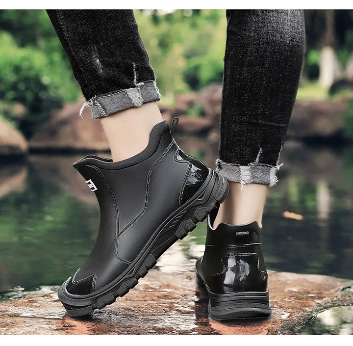 Men's waterproof outdoor ankle boots providing protection for hiking & wet conditions.