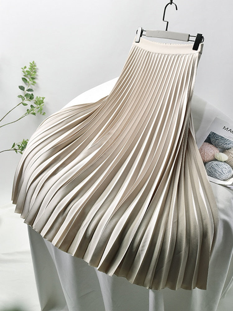 Women's high waist pleated A-line skirt, elegant and versatile for formal or party wear.