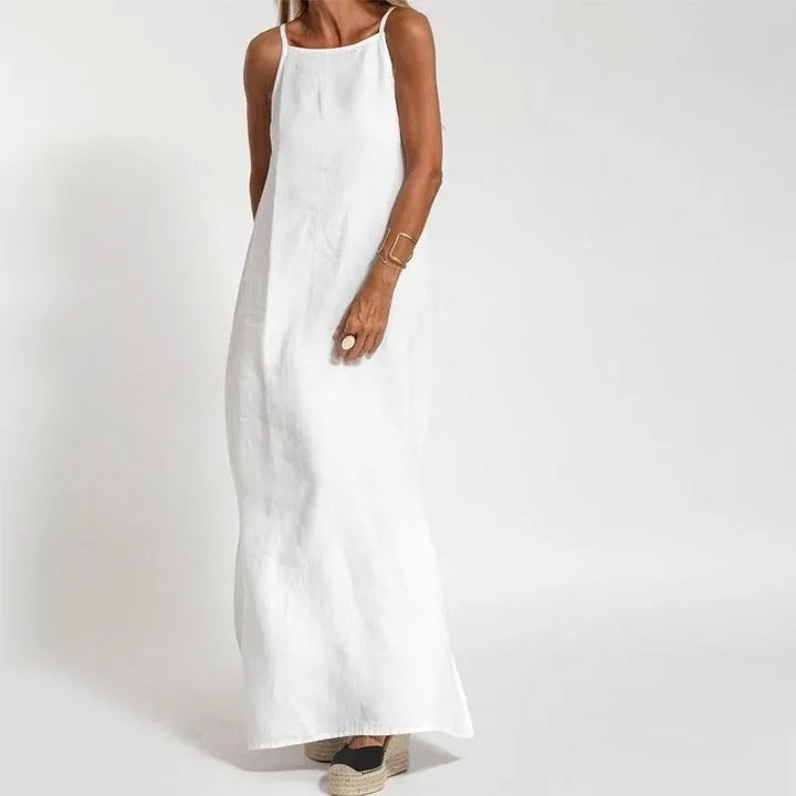 Beautiful women's elegant maxi slip dress with side slits. Ideal for summer, evening events & vacation fashion.