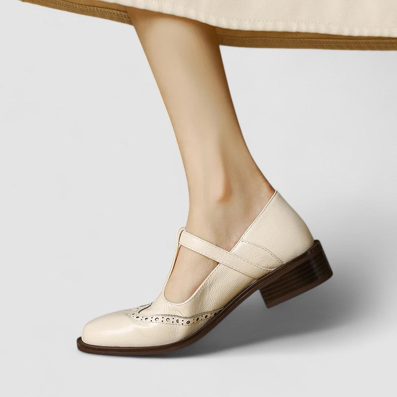 Women's classic Mary Jane shoes featuring an elegant instep strap, comfortable round toe flats.