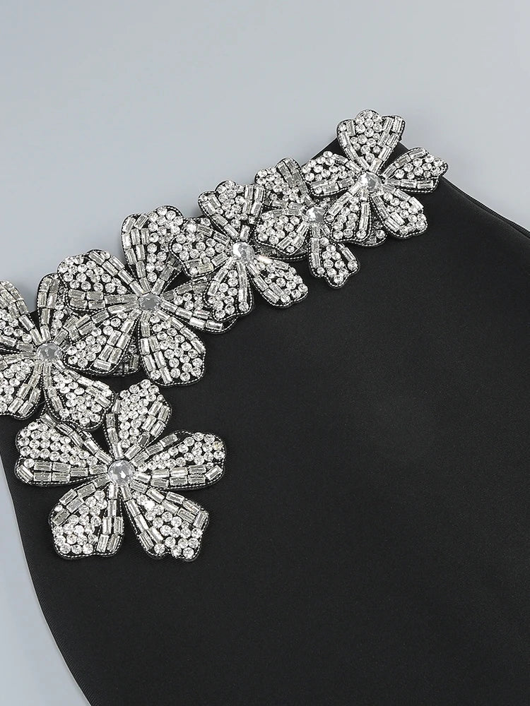 Chic women's two-piece set, elegantly embellished for a sophisticated night out or Christmas party look.