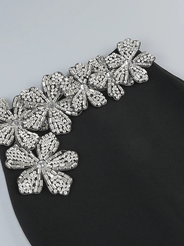 Chic women's two-piece set, elegantly embellished for a sophisticated night out or Christmas party look.
