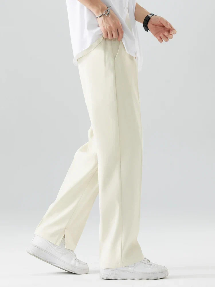 Black men's breathable relaxed fit straight leg trousers, full length for comfort & style.