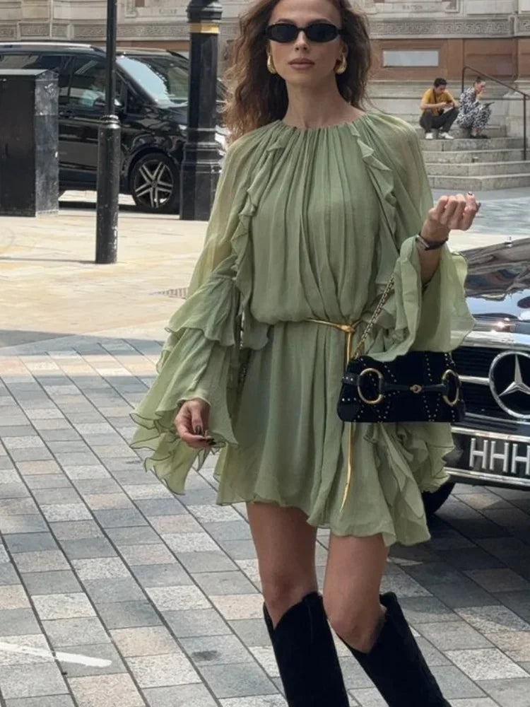 Comfortable women's flowing mini dress, a versatile summer day dress with an elegant tiered design.