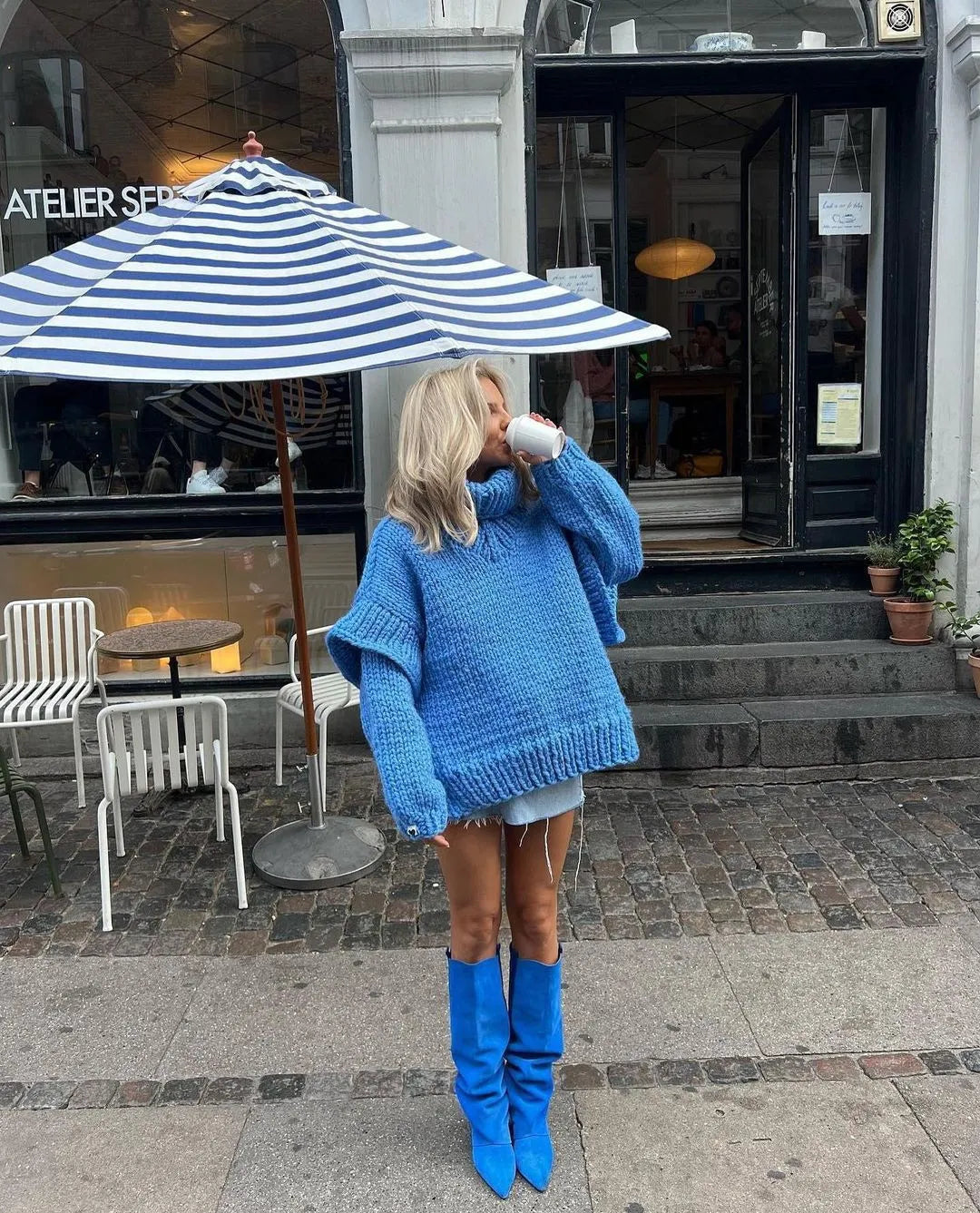 Women's oversized turtleneck knit sweater dress, a cozy and chic long sleeve mini for winter style.