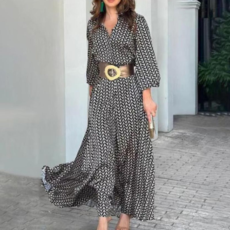 Women's vintage boho print maxi dress. Elegant long summer dress with a vibrant pattern, perfect for casual or stylish wear.