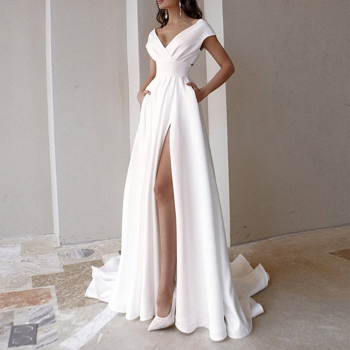 Elegant women's V-neck evening dress with high slit & floor-length design, perfect for formal events & parties.