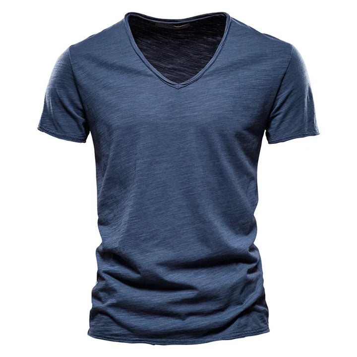 Men's relaxed V-neck summer shirt. Casual, breathable, lightweight, and comfortable for everyday warm-weather style.