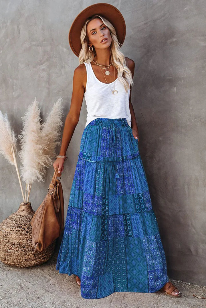 High-waisted A-line maxi skirt for women, vibrant floral print, elegant and comfortable.