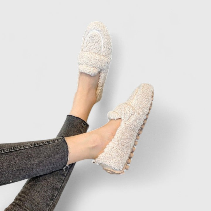 Loafer style women's warm slippers, elegant and cozy for home. Comfortable non-slip winter indoor footwear.