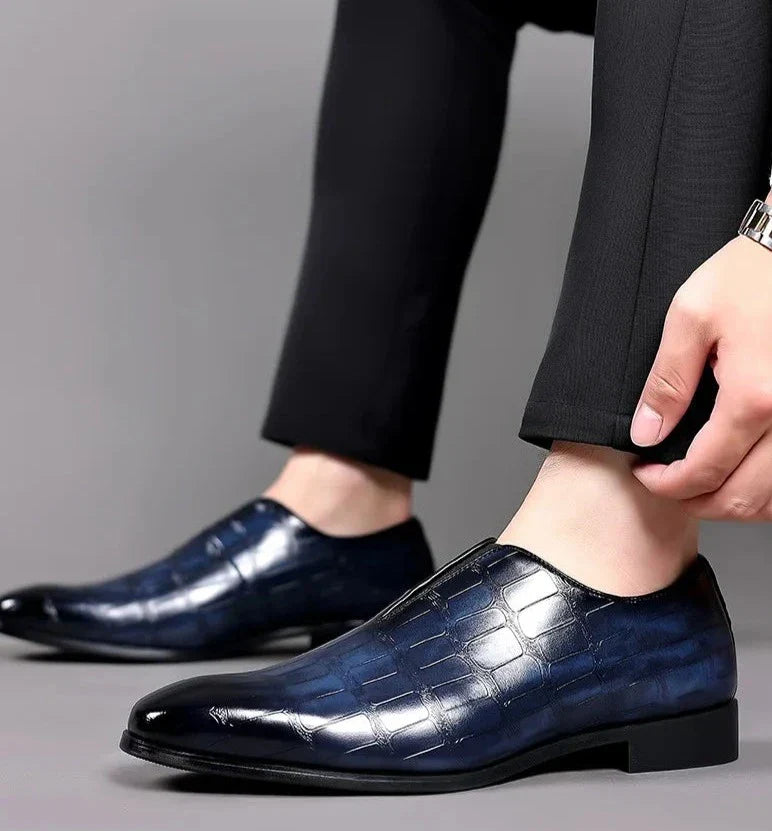 Elegant men's glossy crocodile pattern slip-on dress shoes, essential smart casual and formal footwear.
