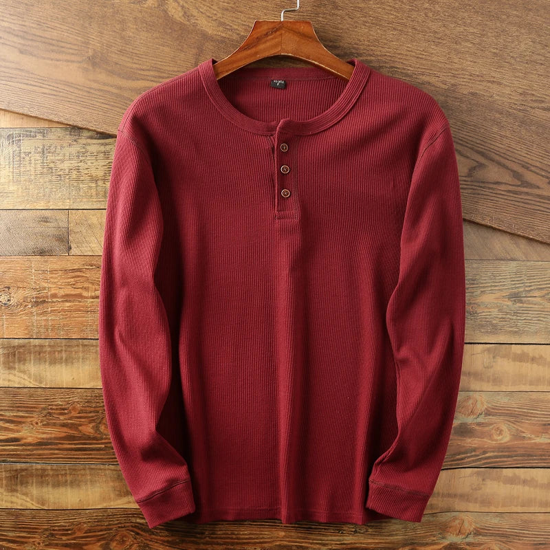 Comfortable and breathable men's long sleeve waffle henley, essential for minimalist fashion.